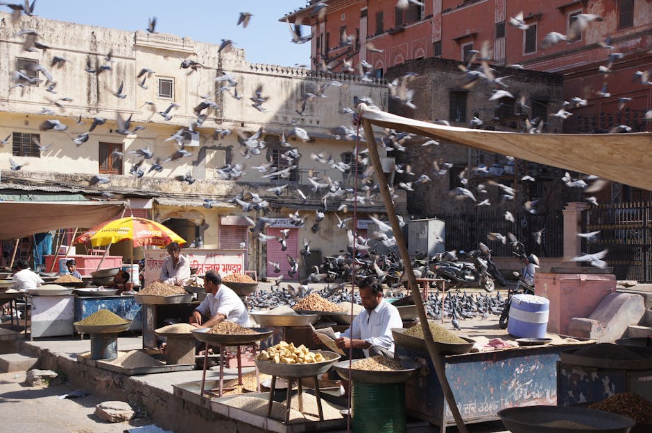 Bustling Jaipur market street with vendors